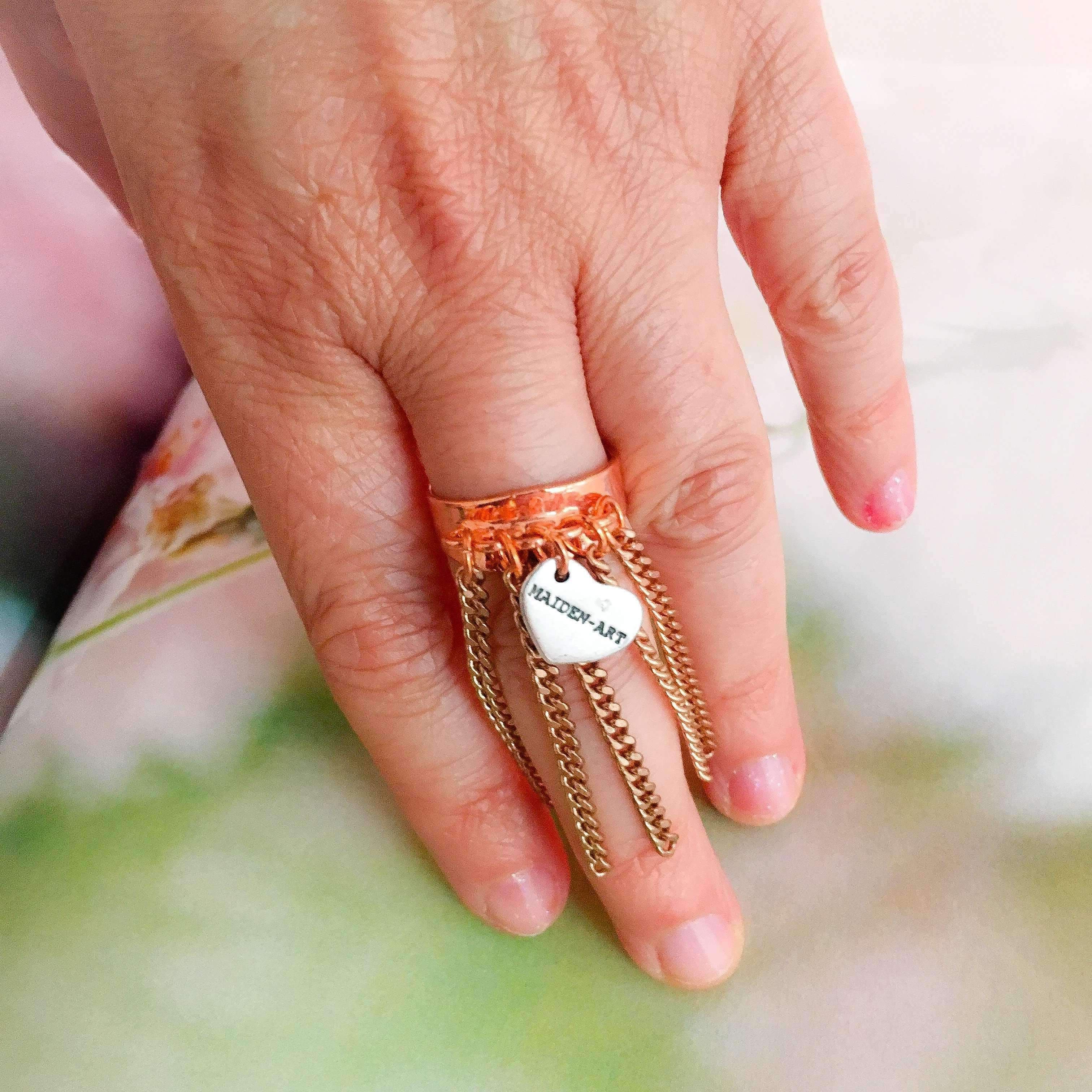 image-Statement ring in rose gold with fringes