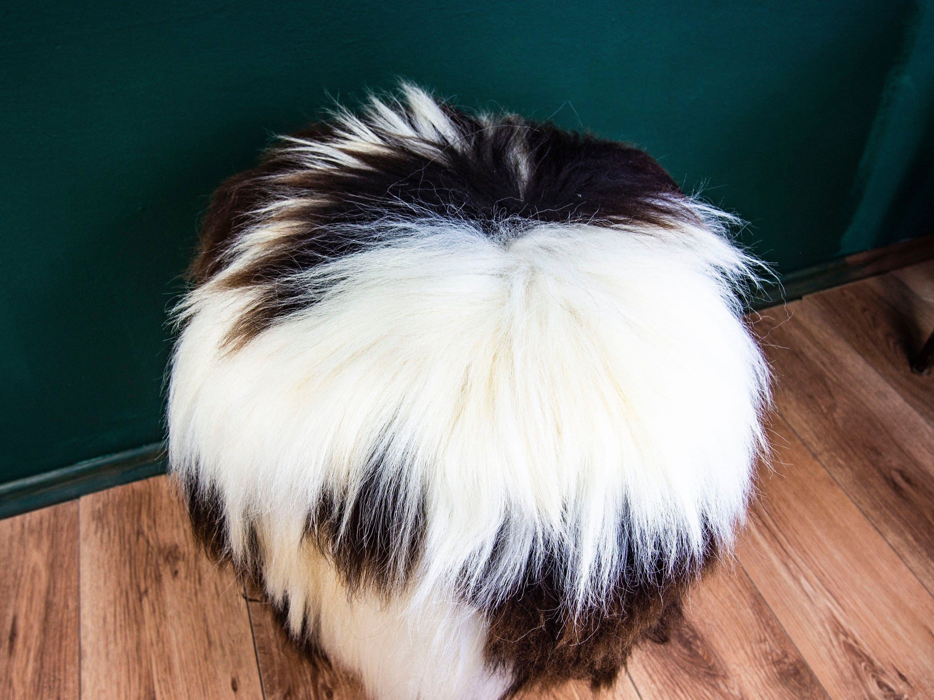 image-Birch Wood and real Jacob sheepskin Ottoman