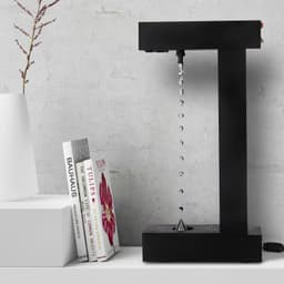 image-Anti-Gravity Suspended Droplets Flow Backwards