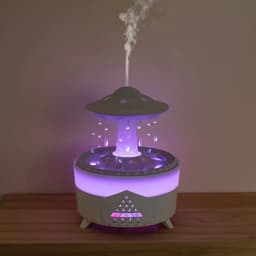 image-New UFO Raindrop Humidifier Water Drop Air Humidifier USB Aromatherapy Essential Oils Aroma Air Diffuser Household Mist Maker Home Decor
