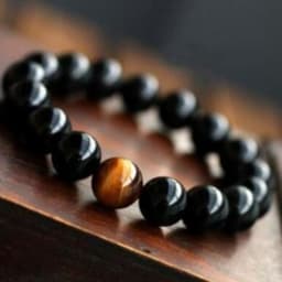 image-Natural Black Onyx With Stone Tiger Eyes Energy Bracelet