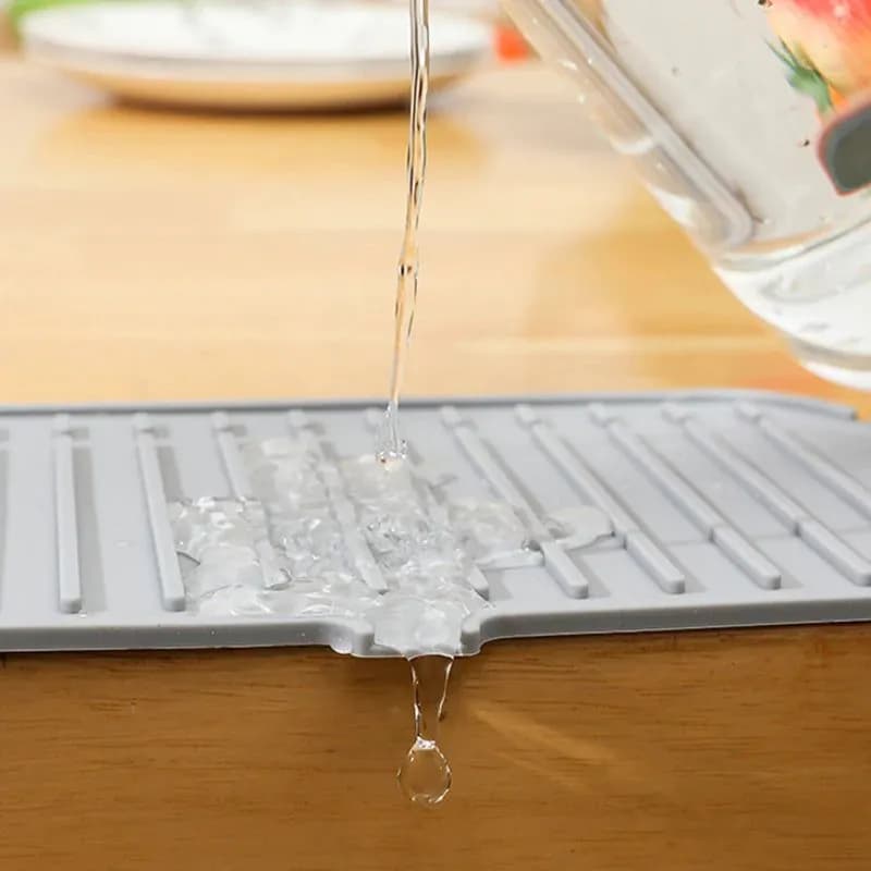 image-Kitchen Silicone Drainage Pad Bathroom Faucet Drip Mat Wash Basin Sink Splash Proof Draining Pad Table Heat Insulation Protector