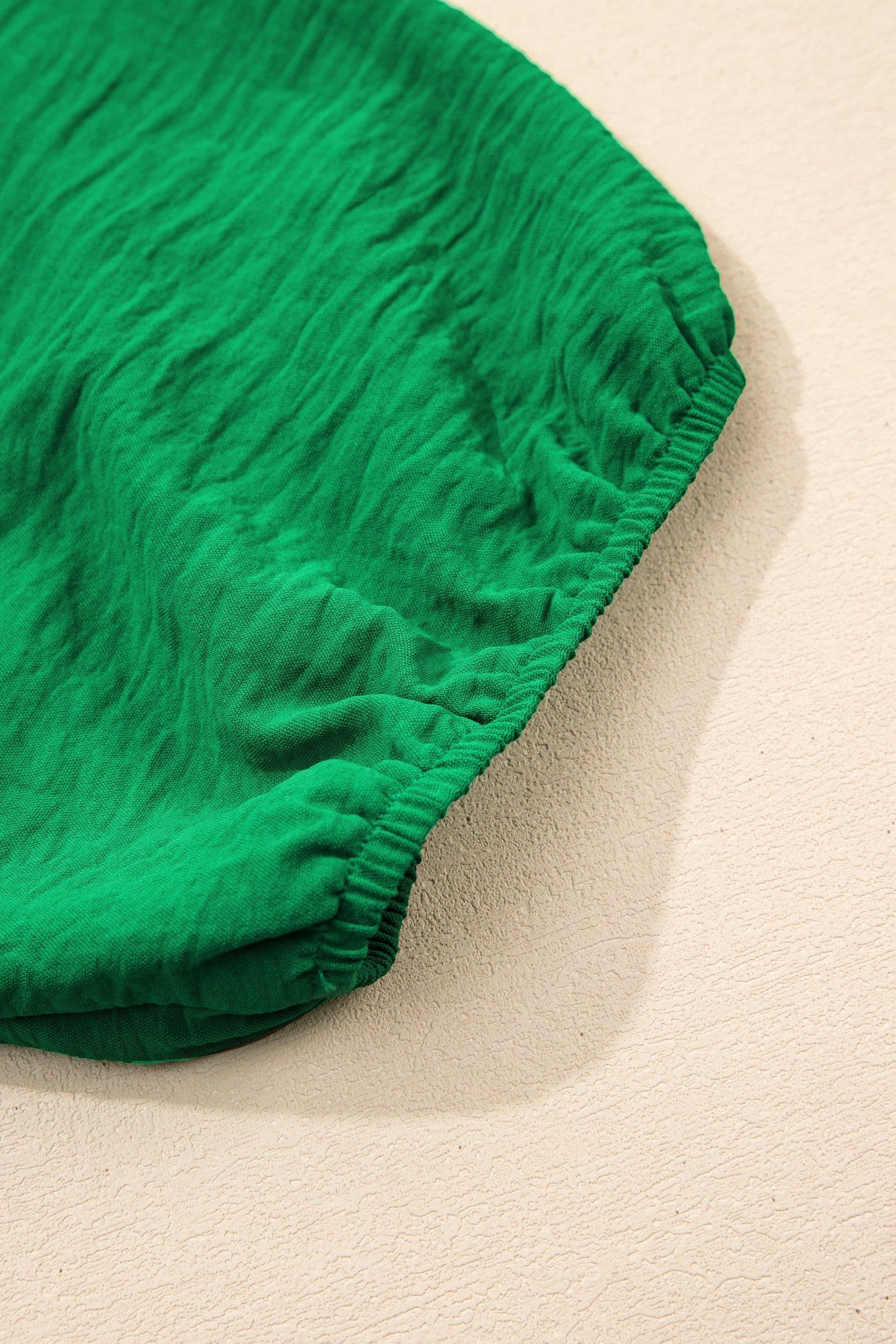 image-Dark Green Peplum Top - Ruched Waist Tied Back