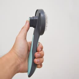 image-Cross-border new pet comb Stainless steel automatic hair removal cat comb