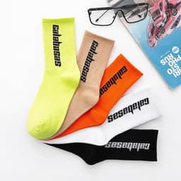 image-Socks men and women ins tide brand street long tube skateboard socks coconut high letter basketball socks grandpa same socks