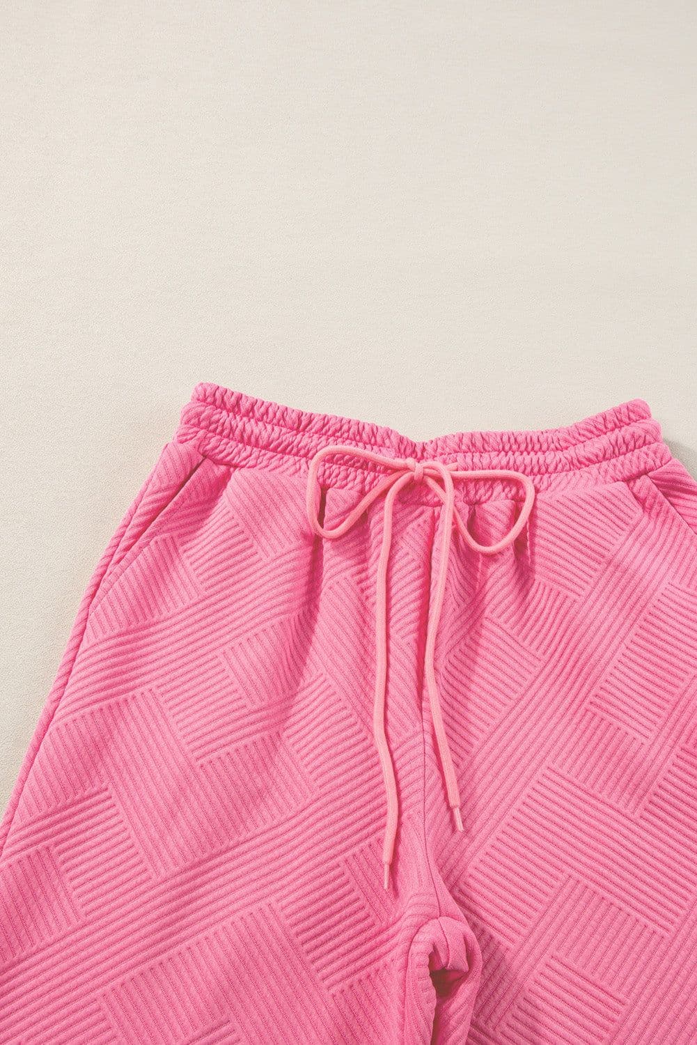 image-Strawberry Pink Textured Loose Fit T Shirt and Drawstring Pants Set