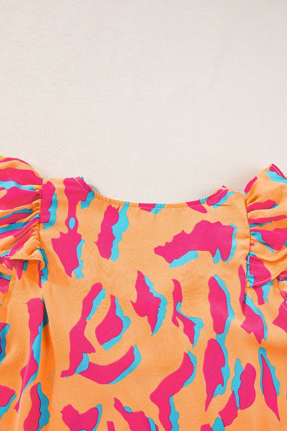 image-Abstract Print V-Neck Blouse - Orange Ruffled Sleeves