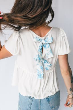 image-White Textured Knit V Neck Short Bubble Sleeve Peplum Top