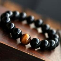 image-Natural Black Onyx With Stone Tiger Eyes Energy Bracelet