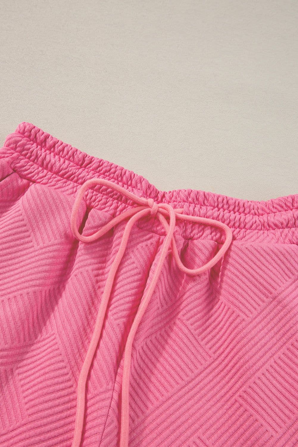 image-Strawberry Pink Textured Loose Fit T Shirt and Drawstring Pants Set