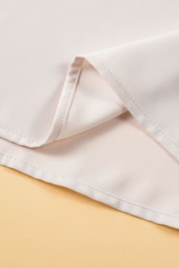 image-Oatmeal Solid Ruffle Trim Sleeveless Top