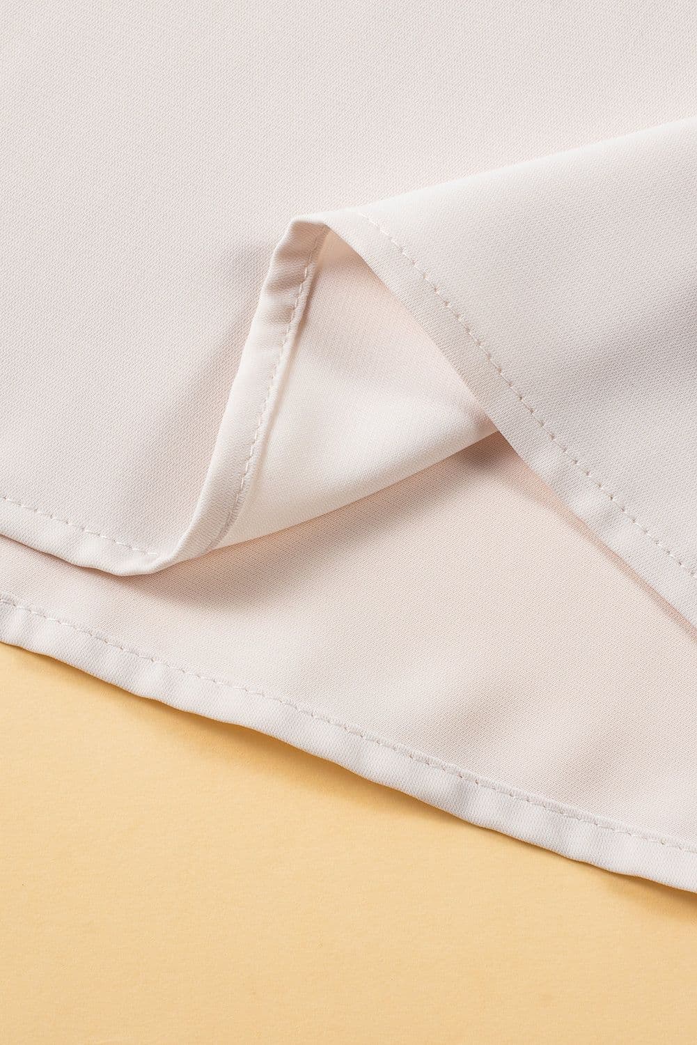 image-Oatmeal Solid Ruffle Trim Sleeveless Top