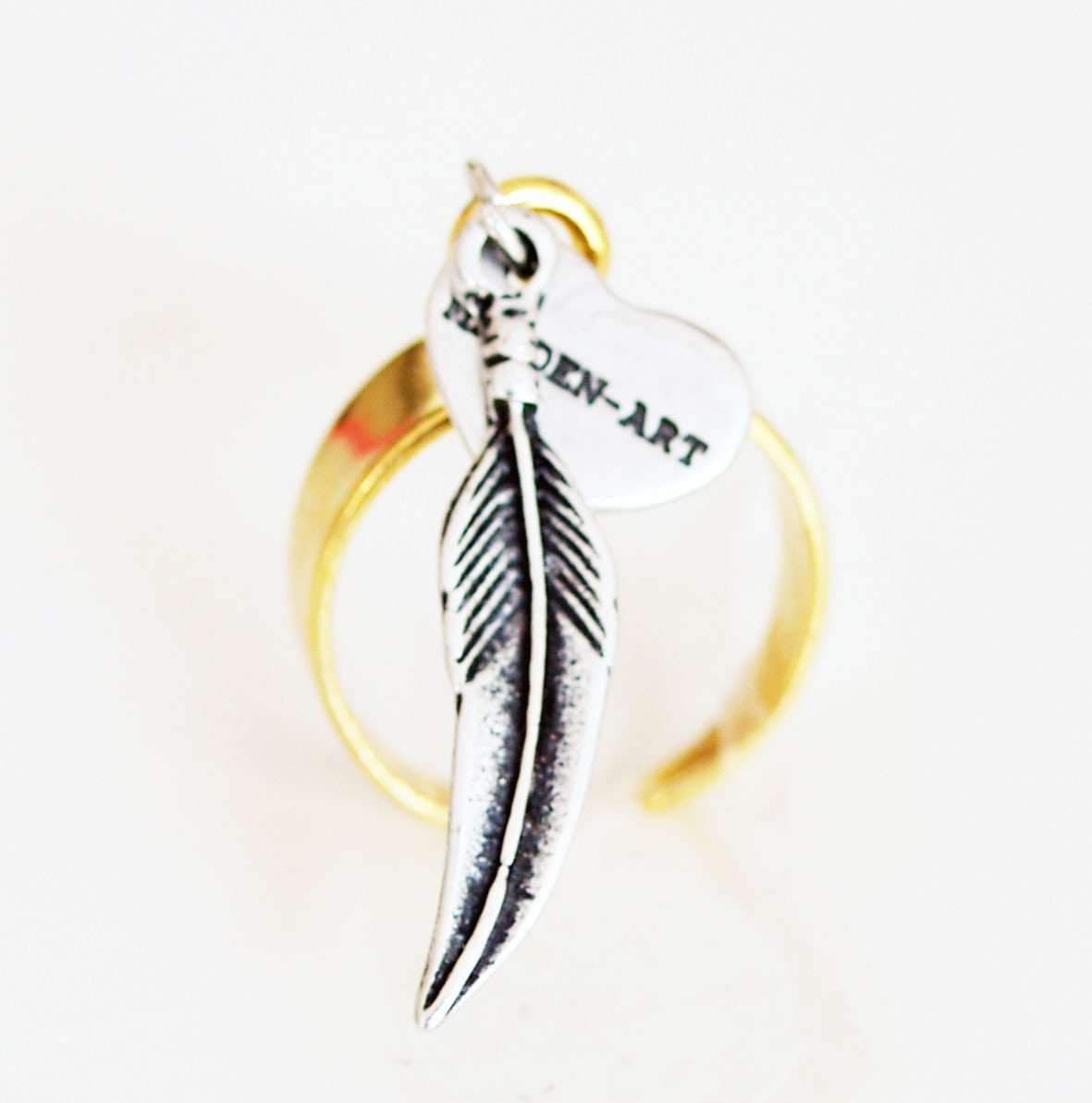 image-Statement ring in gold with feather charm