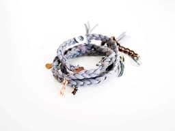 image-Dust wraparound bracelet in deerskin leather with charms