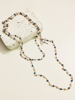 image-Rosary pearls and blu stones long necklace with magic wand and hamsa