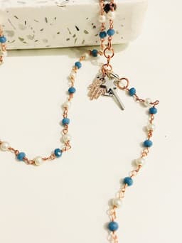 image-Rosary pearls and blu stones long necklace with magic wand and hamsa