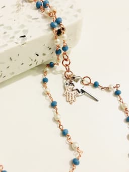 image-Rosary pearls and blu stones long necklace with magic wand and hamsa