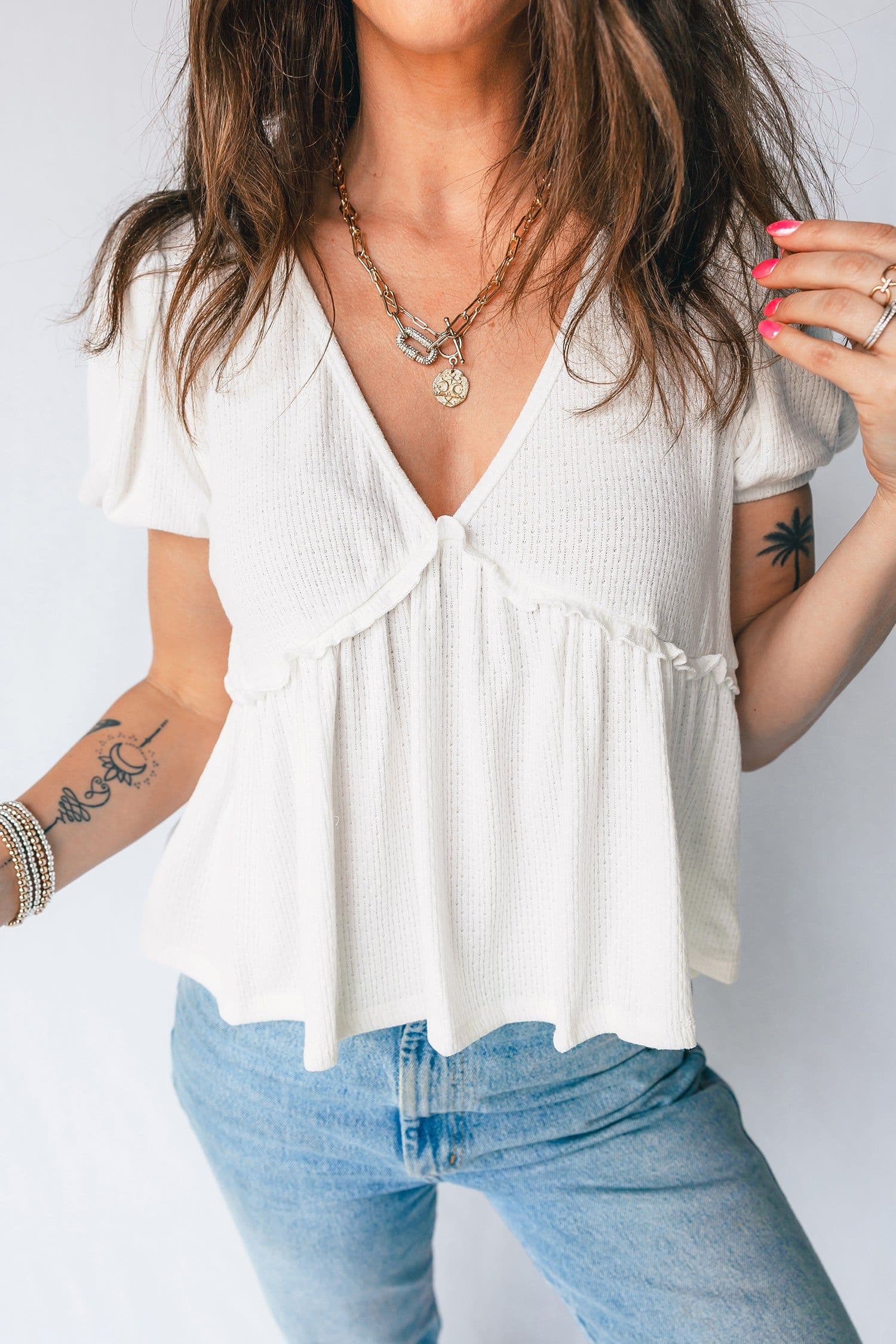 image-White Textured Knit V Neck Short Bubble Sleeve Peplum Top