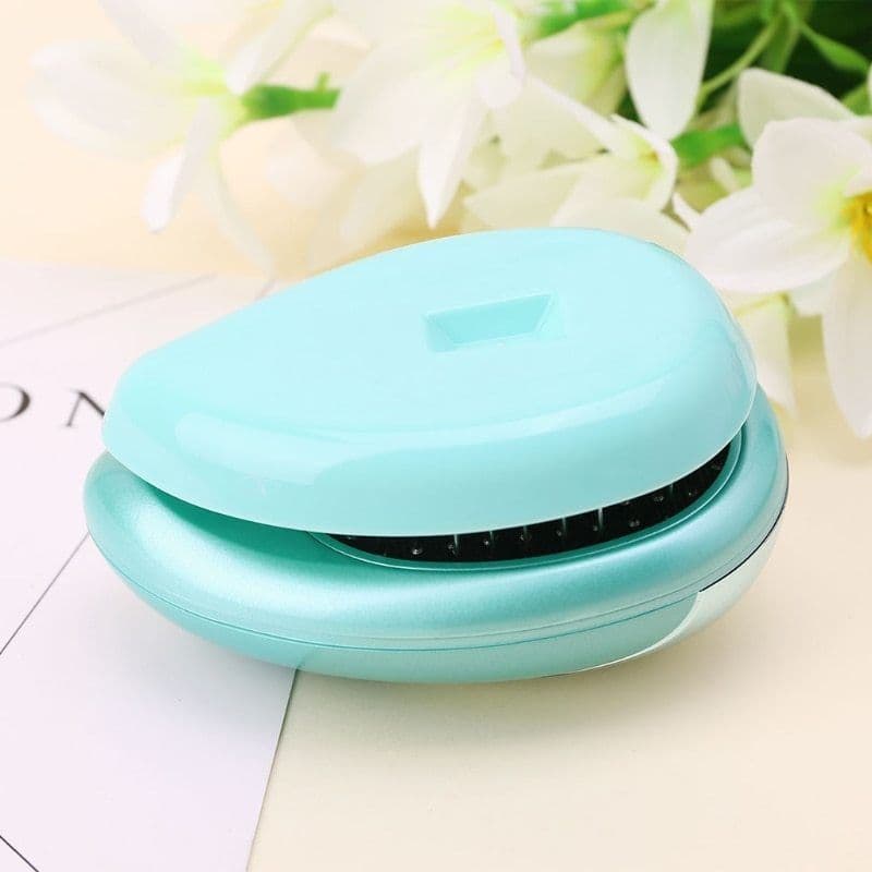 image-Electric Sound Wave Vibration Magnetic Massage Comb Portable Negative Ion Hair Comb