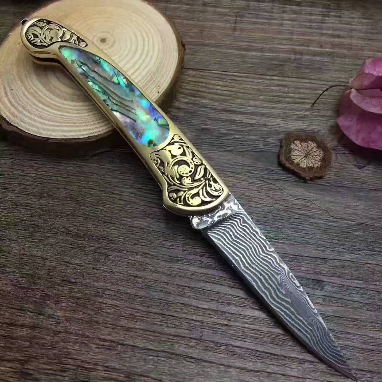 image-Camping Hunting Folding Survival Combat Knife Natural Shell
