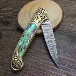 image-Camping Hunting Folding Survival Combat Knife Natural Shell