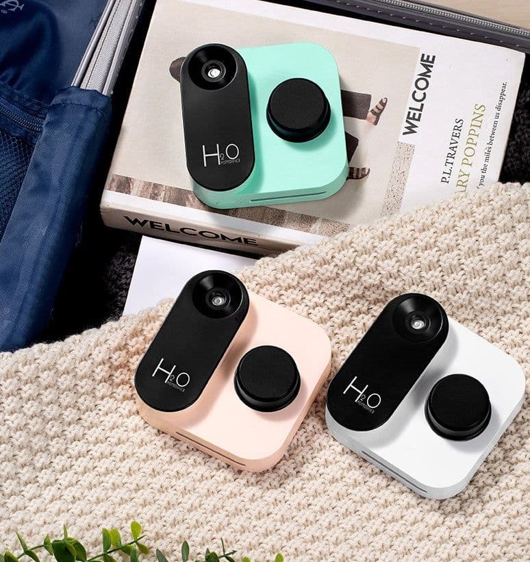 image-Mineral Water Bottle Humidifier Big Spray Wireless Rechargeable Usb Car Humidifier