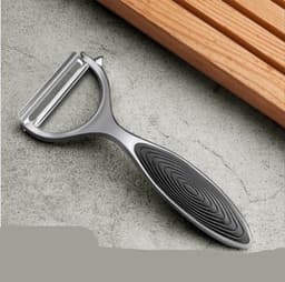 image-Stainless steel peeler and scraper