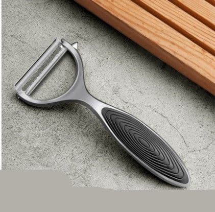 image-Stainless steel peeler and scraper