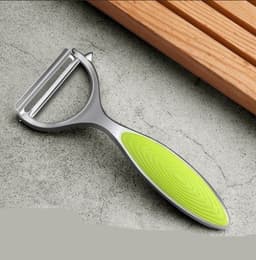image-Stainless steel peeler and scraper