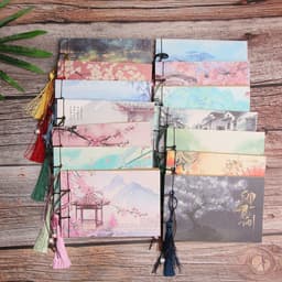 image-A blank notebook with tassels