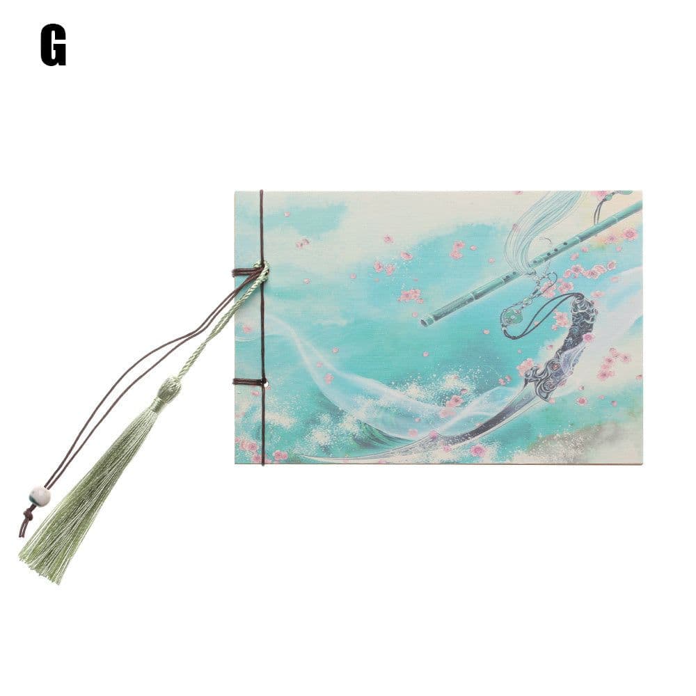 image-A blank notebook with tassels