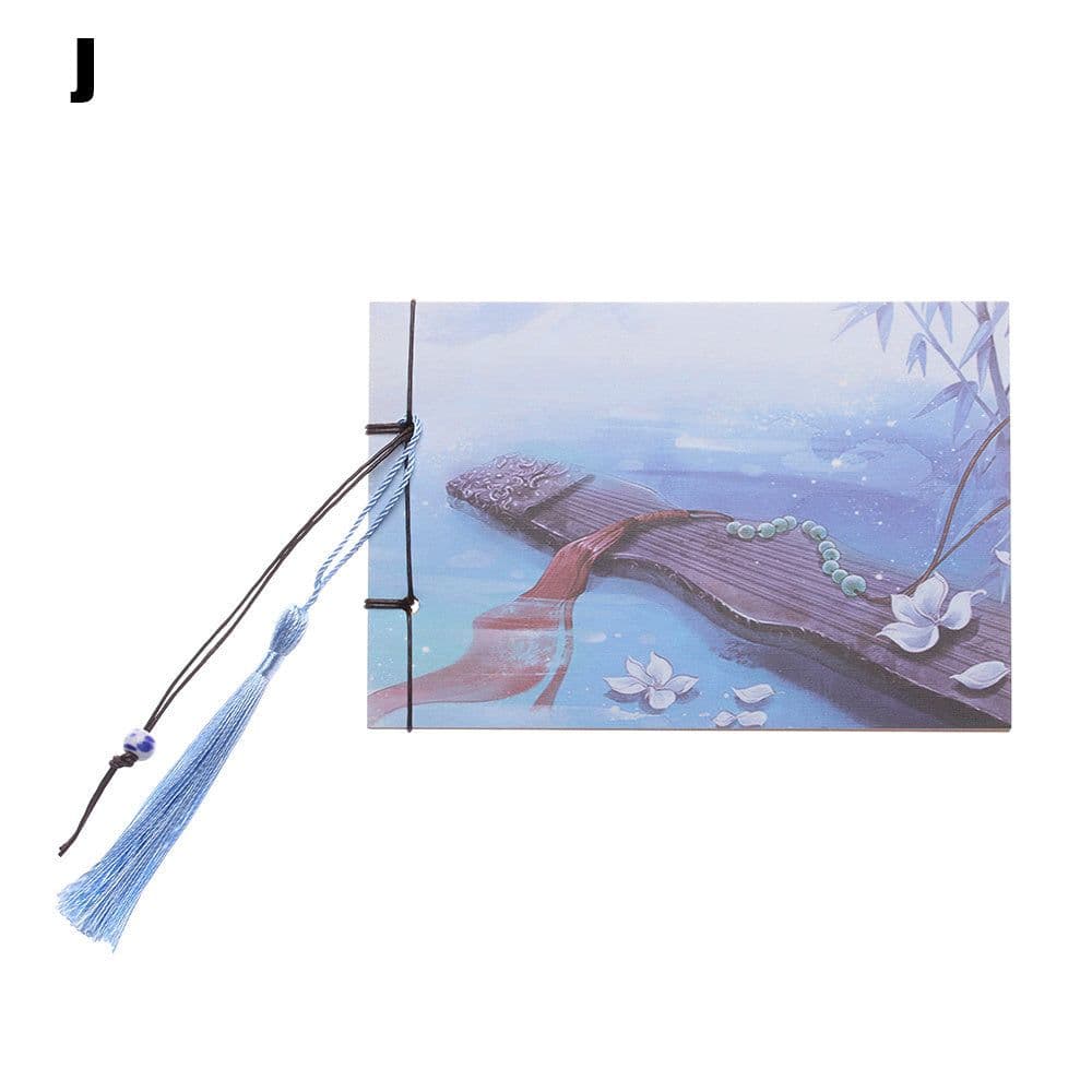 image-A blank notebook with tassels