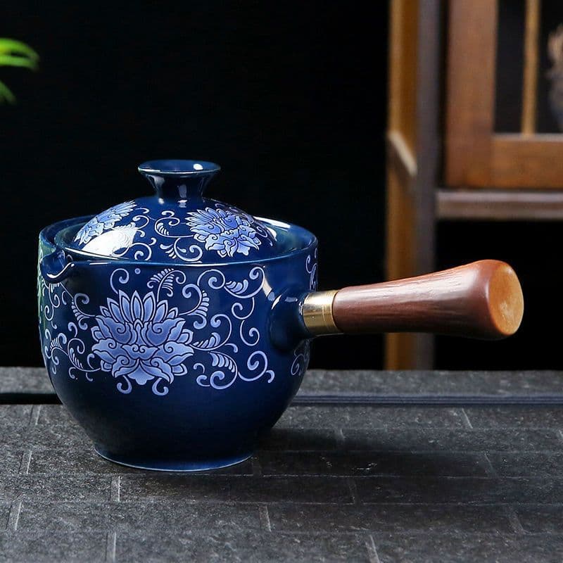 image-Ceramic Teapot With Wooden Handle Side-handle Pot Household Kung Fu Oolong Filter Tea Maker Creative Black Pottery Teaware Gifts