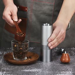 image-Hand Grinder Coffee Machine Grinding Household Small Portable