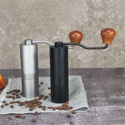 image-Hand Grinder Coffee Machine Grinding Household Small Portable