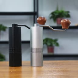 image-Hand Grinder Coffee Machine Grinding Household Small Portable