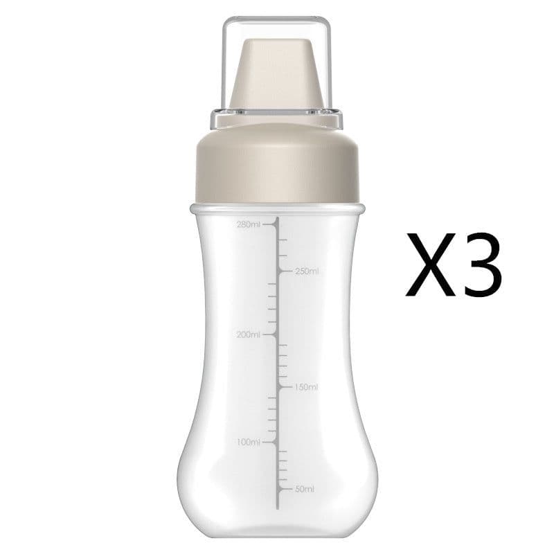image-Five-hole Scale Squeezing Sauce Bottle With Lid Kitchen Tool