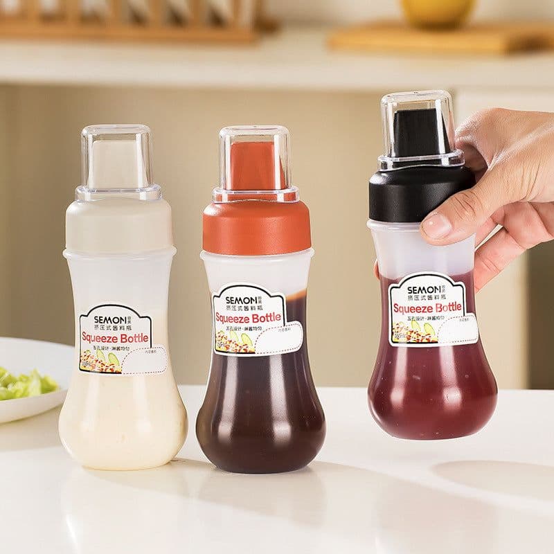 image-Five-hole Scale Squeezing Sauce Bottle With Lid Kitchen Tool