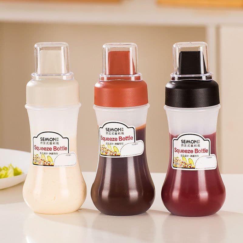 image-Five-hole Scale Squeezing Sauce Bottle With Lid Kitchen Tool