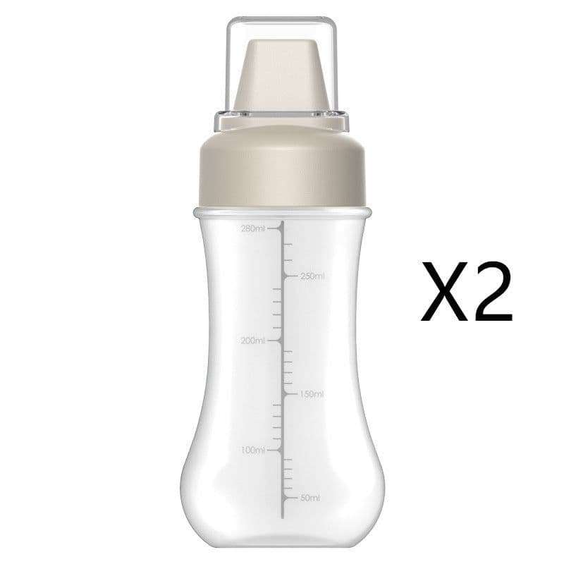 image-Five-hole Scale Squeezing Sauce Bottle With Lid Kitchen Tool