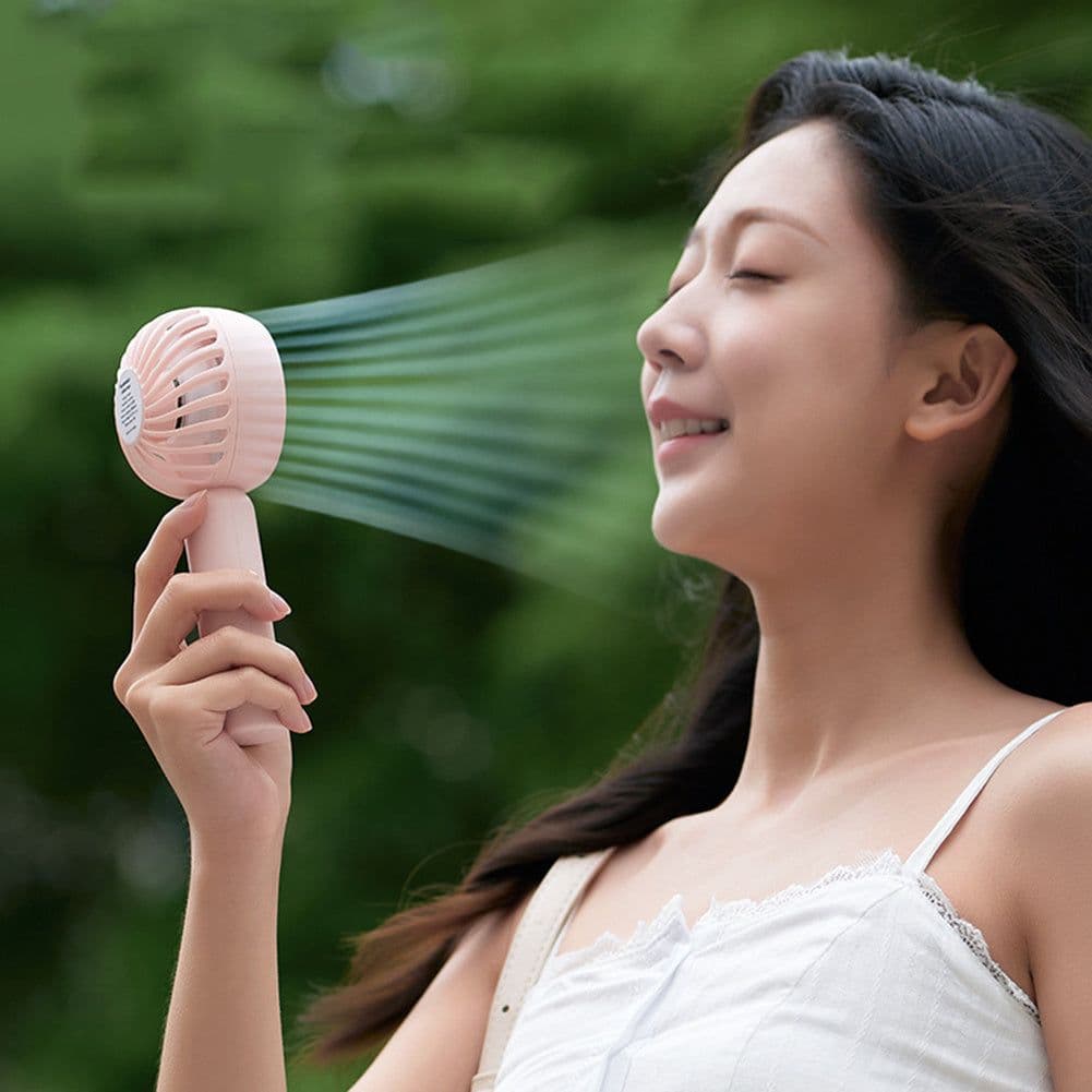 image-Mini Handheld Mute Fan Semiconductor Refrigeration Cooling Portable Air Conditioner Battery USB Rechargeable Fan Outdoor