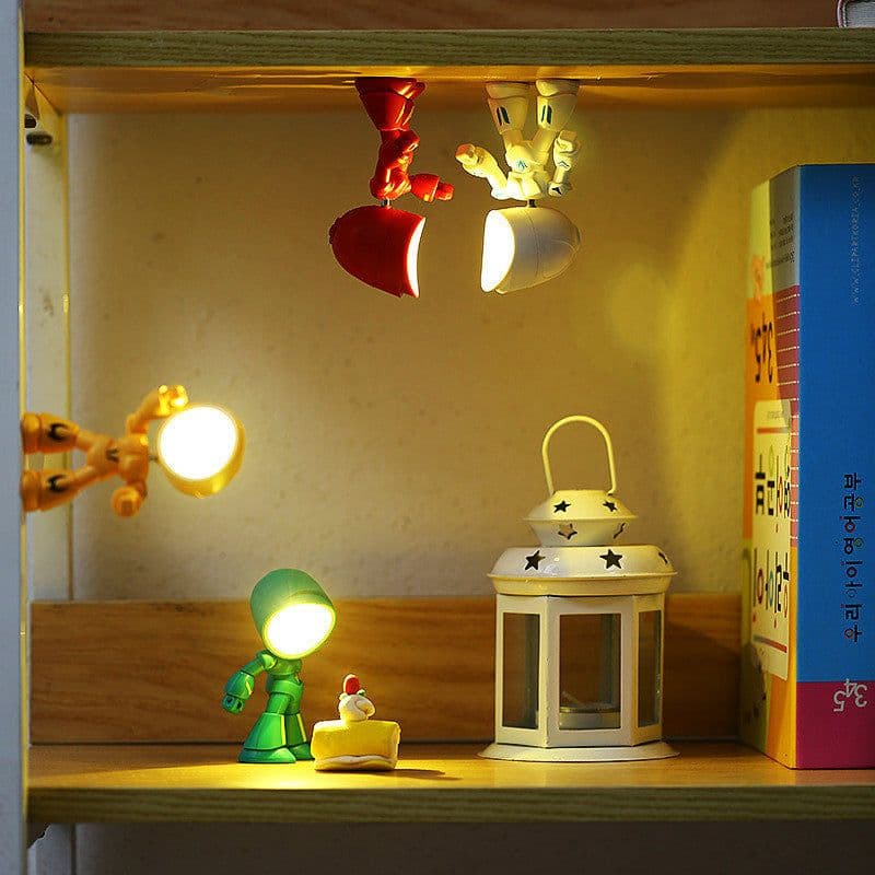 image-Cute LED Hero Table Lamp Mini Portable Cool Mecha Cute Robot Night Light Bedroom Home Decoration Kids Boys Gifts
