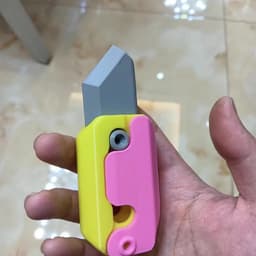 image-3D Printing Gravity Cub Jumping Small Radish Knife Mini Model Student Prize Pendant Decompression Toy For Children Gift