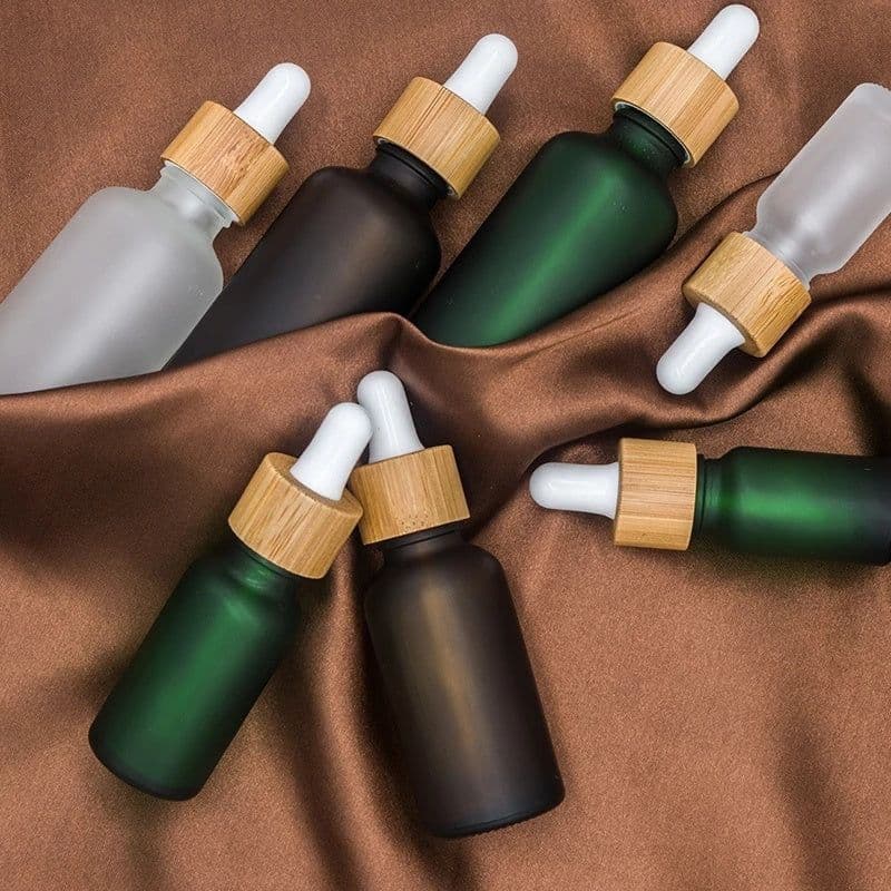 image-Glass Fine Oil Bottle Avoid Light Glue Head Dropper Bottle Stock Bottling Cosmetics