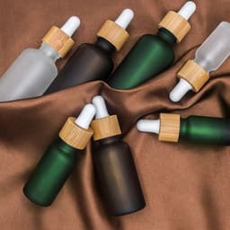 image-Glass Fine Oil Bottle Avoid Light Glue Head Dropper Bottle Stock Bottling Cosmetics