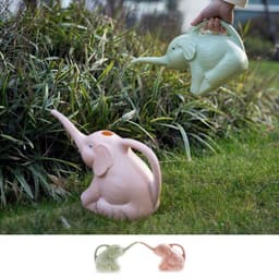 image-Baby elephant watering flowers