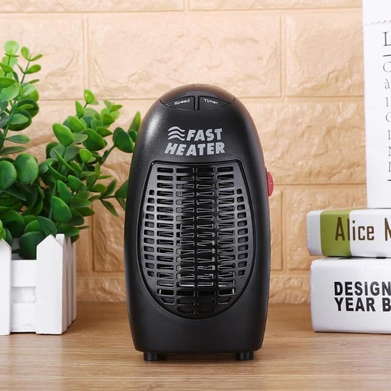 image-Electric heater 360 rotating plug mini heater small appliances