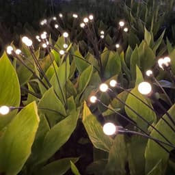 image-Dual-mode Outdoor Solar Pneumatic Courtyard Garden Atmosphere Lawn Breathing FireFly Ground Plug Lamp