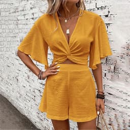 image-Fashion Loose Suits For Women V-neck Ruffle Sleeve Short-sleeved Top And Shorts Summer Two-piece Set Clothing