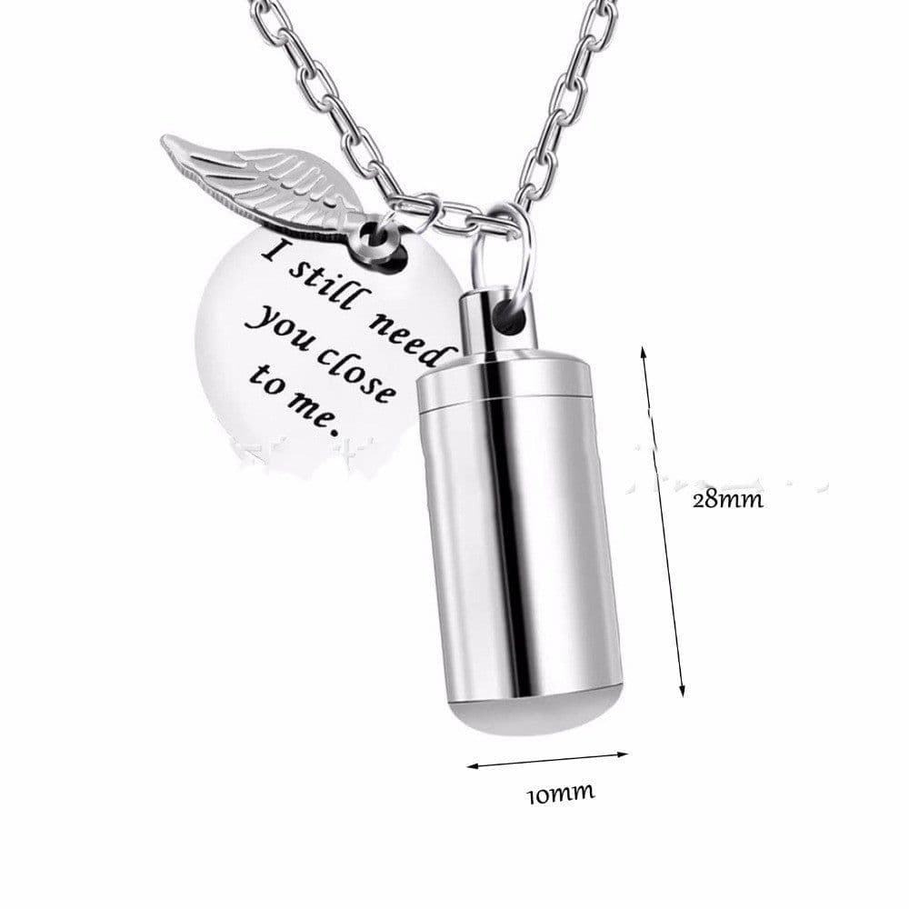 image-Stainless Steel Small Cylinder Perfume Bottle